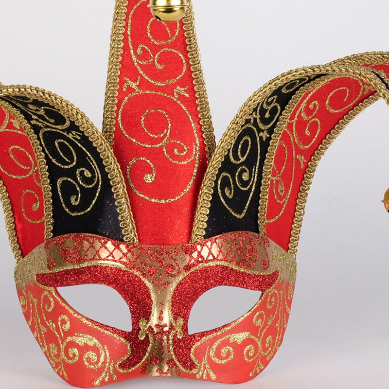 Close-up of red black and gold detailing on Colombina Jolly Brillante Venetian mask