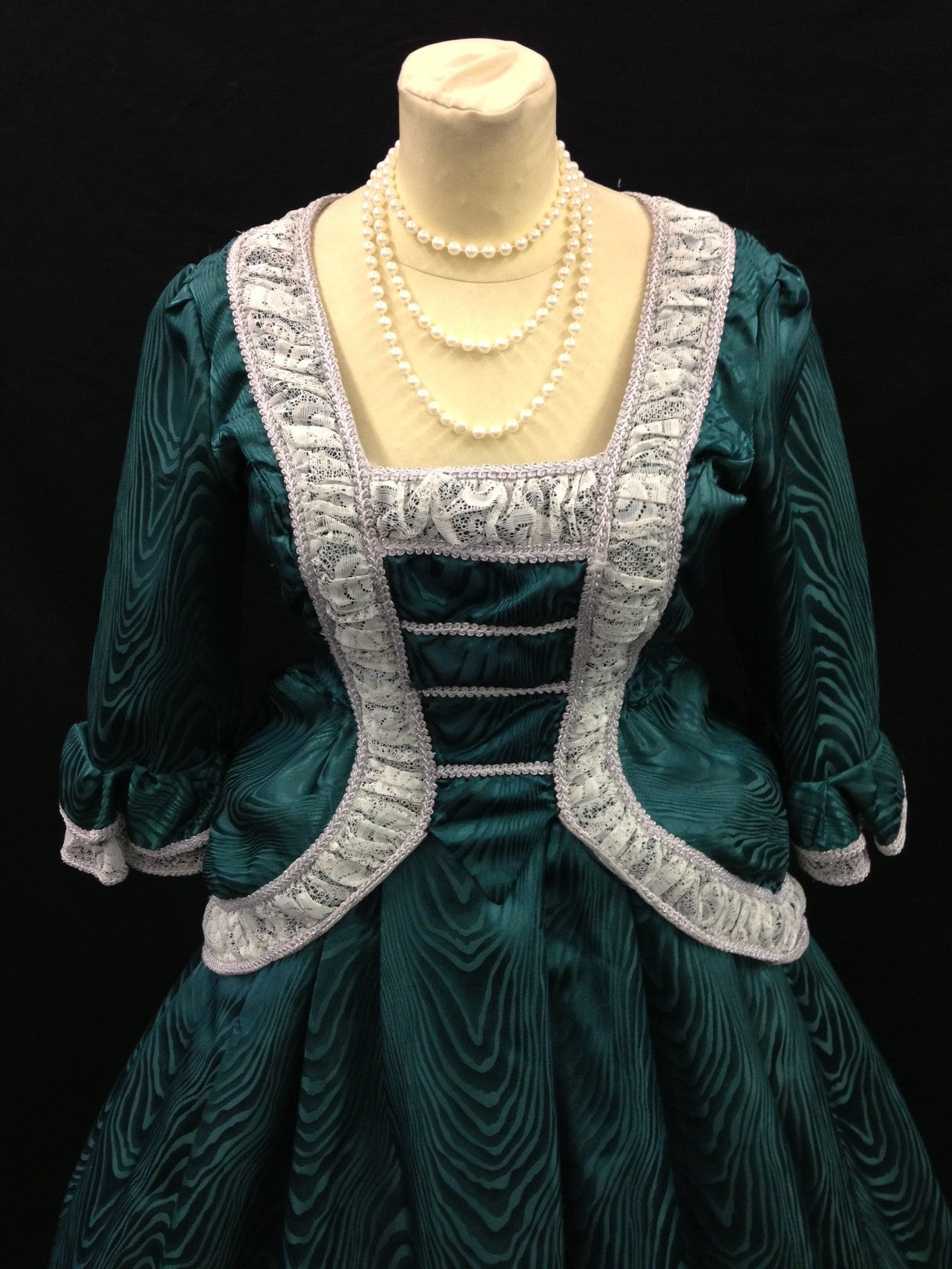 green top and skirt close up